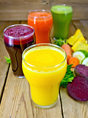 Image showing Juice vegetable in four glasses on board