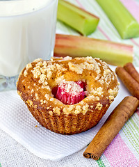 Image showing Cupcake with rhubarb and cinnamon on napkin