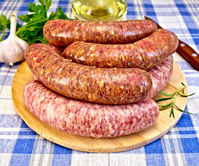 Image showing Sausages pork and beef on blue cloth