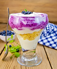 Image showing Dessert milk with blueberries on board