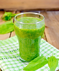 Image showing Cocktail with spinach on napkin and board