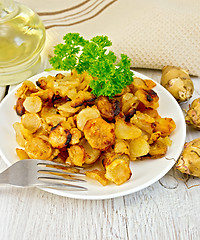 Image showing Jerusalem artichokes fried with parsley on plate