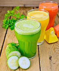 Image showing Juice vegetable in three glasses on wooden board