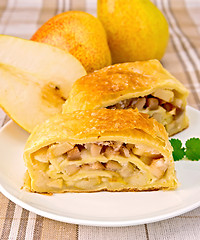 Image showing Strudel with pears on linen tablecloth