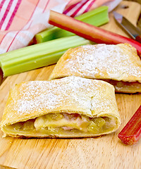 Image showing Strudel with rhubarb and napkin on board