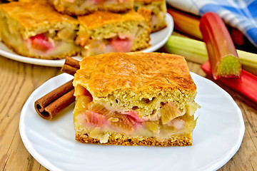 Image showing Pie rhubarb in plate on board