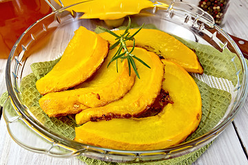 Image showing Pumpkin baked in glass pan on board