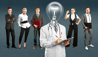 Image showing Business Team With Lamp Head Doctor