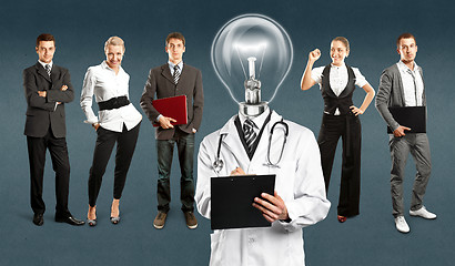 Image showing Business Team With Lamp Head Doctor