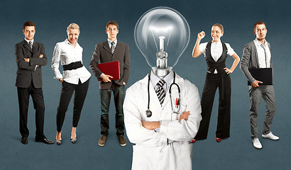 Image showing Business Team With Lamp Head Doctor