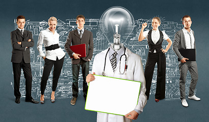 Image showing Business Team With Lamp Head Doctor