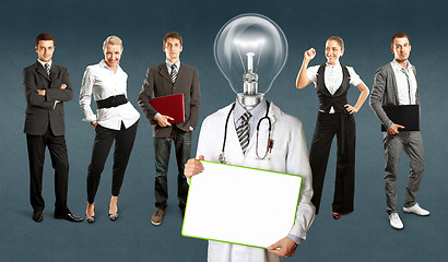 Image showing Business Team With Lamp Head Doctor