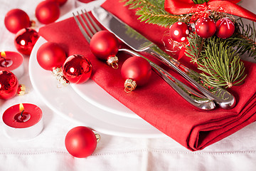 Image showing Red themed Christmas place setting