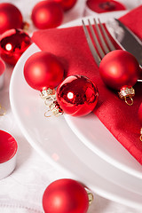 Image showing Red themed Christmas place setting