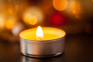 Image showing Warm gold and red Christmas candlelight background