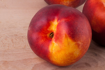 Image showing Three tasty fresh ripe juicy nectarines