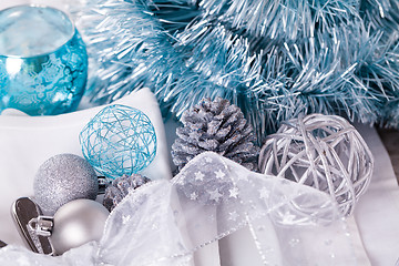 Image showing Stylish blue and silver Christmas table setting