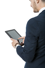 Image showing Businessman using a tablet computer