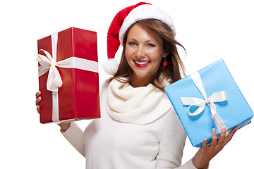 Image showing Vivacious woman in a Santa hat celebrating Xmas