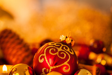 Image showing Warm gold and red Christmas candlelight background