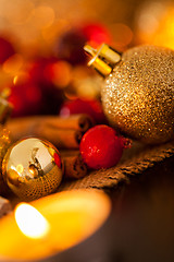 Image showing Warm gold and red Christmas candlelight background