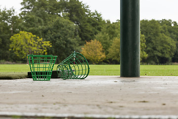 Image showing Empty Golf Ball Baskets at Driving Range