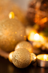 Image showing Warm gold and red Christmas candlelight background