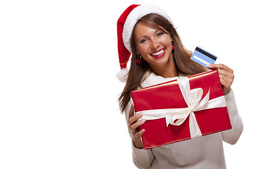 Image showing Woman holding a Christmas gift and bank card