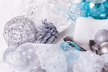 Image showing Stylish blue and silver Christmas table setting