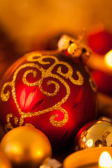 Image showing Warm gold and red Christmas candlelight background