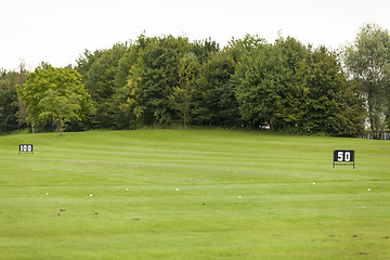 Image showing Empty Golf Ball Baskets at Driving Range