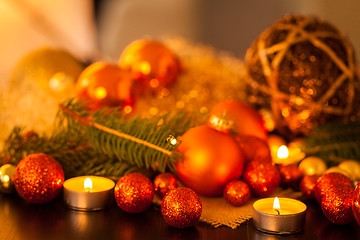 Image showing Warm gold and red Christmas candlelight background