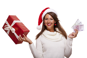 Image showing Young woman with an Xmas gift and money