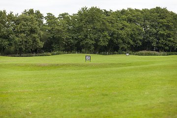 Image showing Empty Golf Ball Baskets at Driving Range