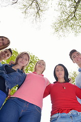 Image showing young friends staying together outdoor in the park