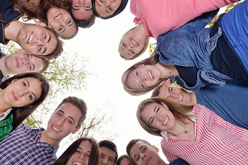 Image showing young friends staying together outdoor in the park