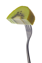 Image showing Kiwi fruit held by fork


