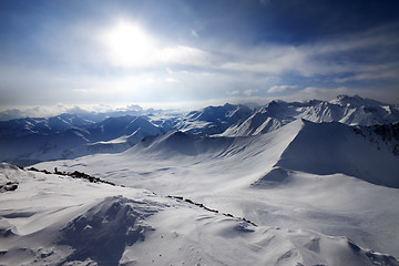 Image showing Snowy mountains and view on off-piste slope