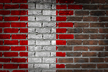 Image showing Brick wall texture with flag