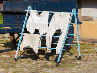 Image showing Vintage clothes on drying rack