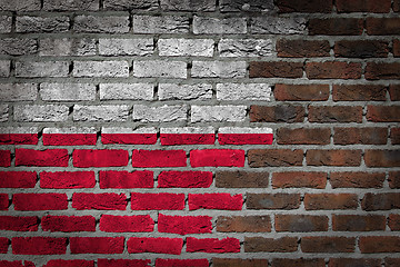 Image showing Brick wall texture with flag