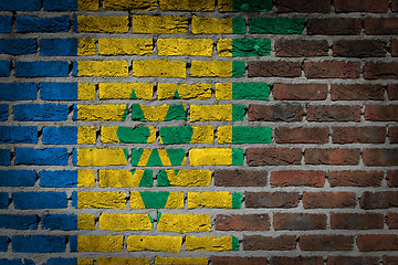 Image showing Brick wall texture with flag