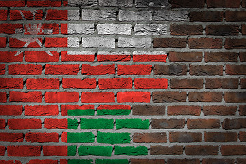 Image showing Brick wall texture with flag