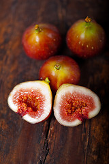 Image showing fresh figs over old wood