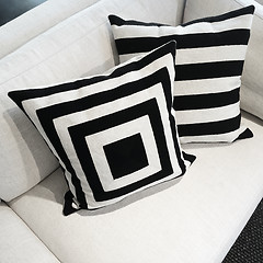 Image showing Black and white cushions on a sofa