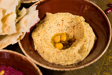 Image showing bowl of creamy hummus