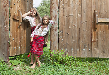 Image showing Sisters outside home