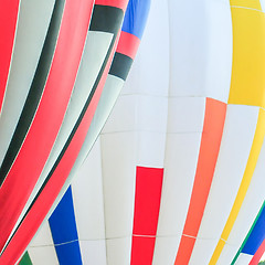 Image showing Colorful hot air balloons at festival 