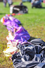 Image showing hot air balloon ready for assembly on a field