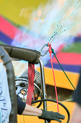 Image showing Fire heats the air inside a hot air balloon at balloon festival 